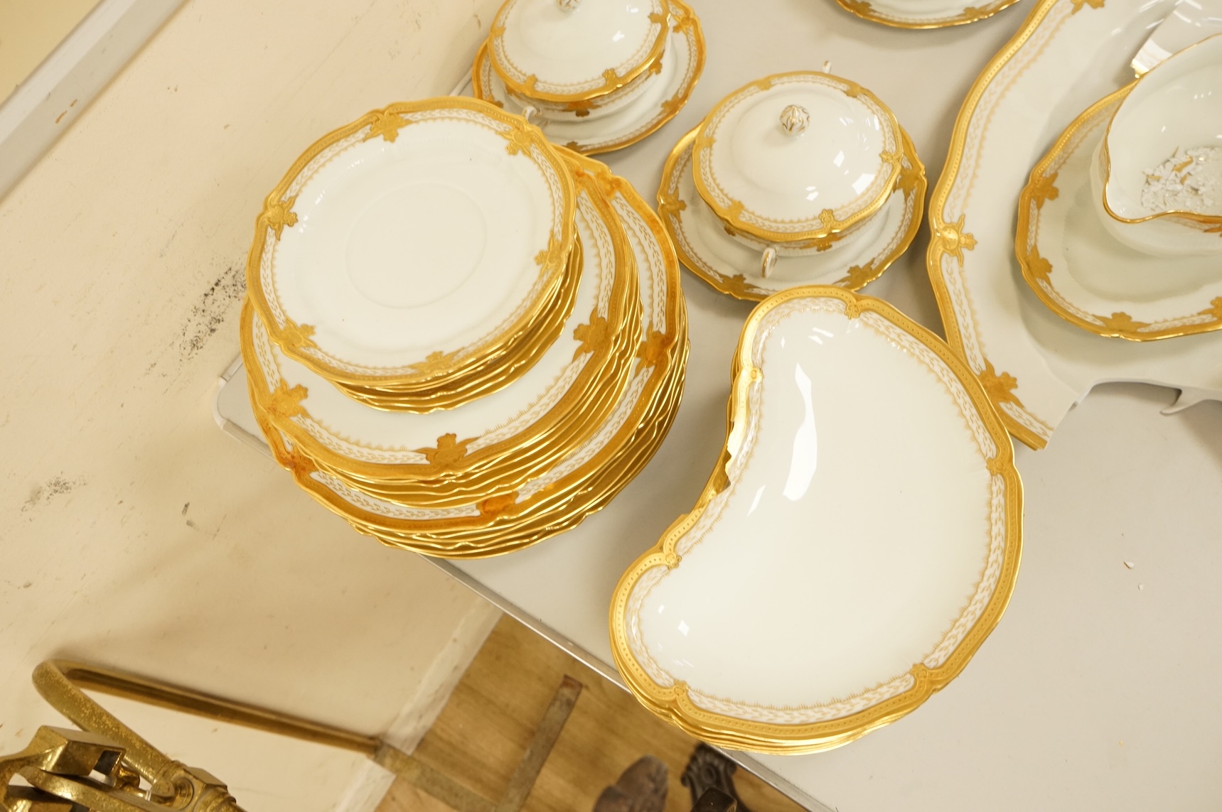A Haviland Limoges dinner service with gilt border